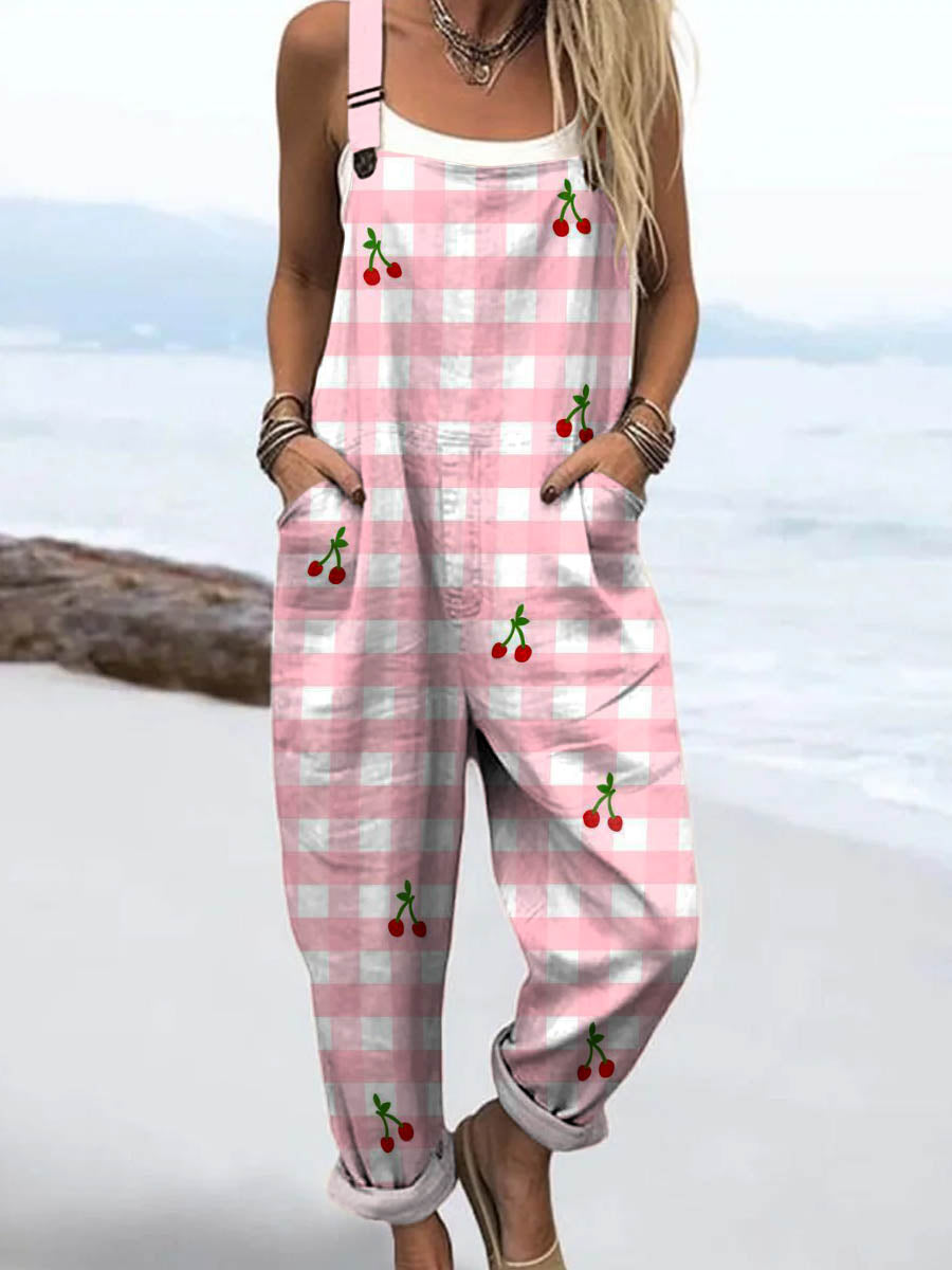 Woman wearing pink cherry jumpsuit